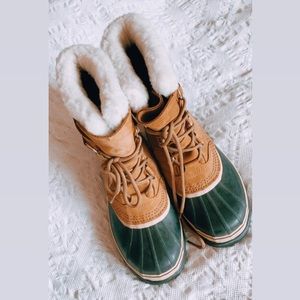Tan and black Sorel winter snow boots